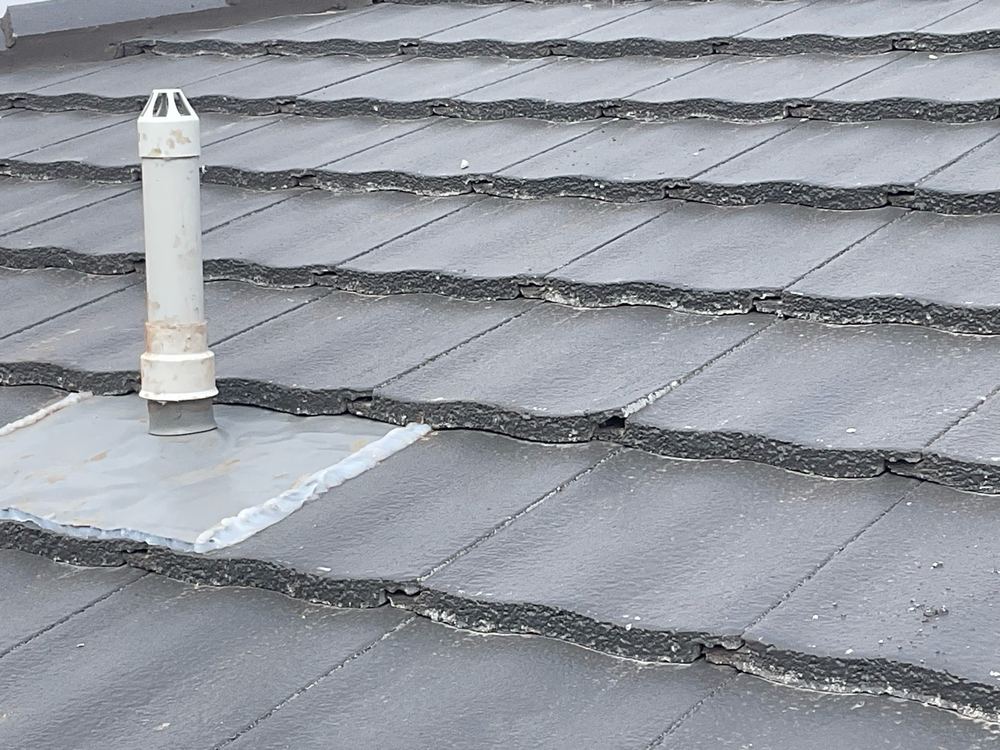 Broken tile on the roof, an easy path for rain into the ceiling, Aintree, Deanside