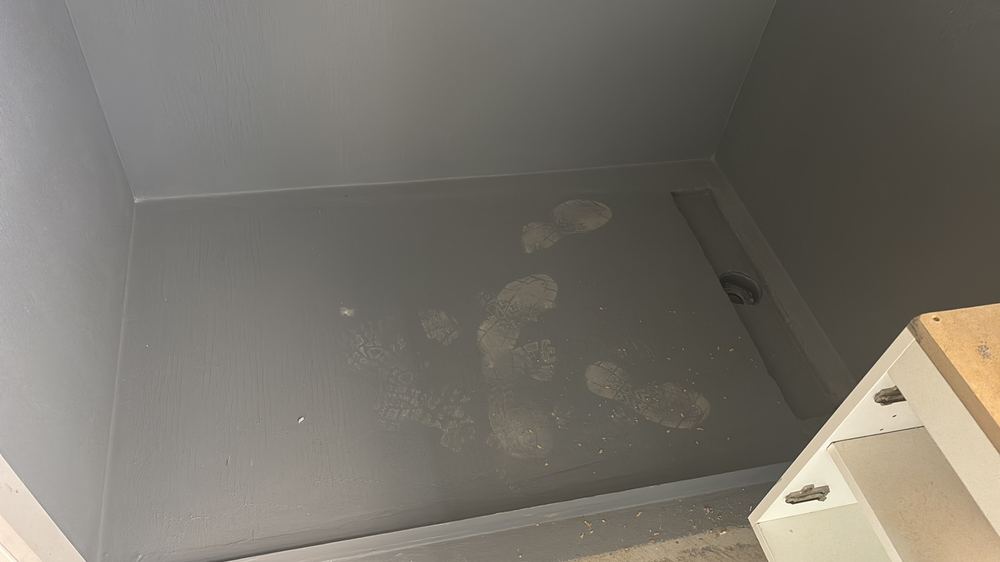 Shower membrane exposed to damage before the tiler covers it, found during a waterproofing inspection in Hoppers Crossing